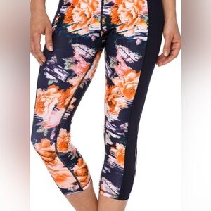 Betsey Johnson Give Love Get Love
Navy Floral Yoga Capri Legging Cut Out Size M